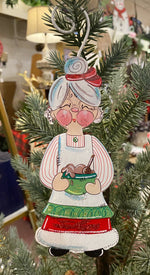 Load image into Gallery viewer, Baking Santa and Mrs. Claus Metal Ornaments in Red, White, and Green
