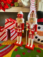 Load image into Gallery viewer, Christmas Nutcrackers Red &amp; White Candy Accents Set of 2
