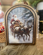 Load image into Gallery viewer, Arch Top Wooden Classic Santa Art with Snow or Round Wood Frame
