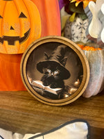 Load image into Gallery viewer, Black Cat with Witch Hat and Spell Book 8” Round Framed Picture
