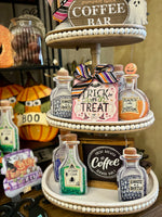 Load image into Gallery viewer, Halloween Potion Bottles Metal Stakes with Easels Black, Purple, Orange, and Yellow with her Frog Roundtop Collection
