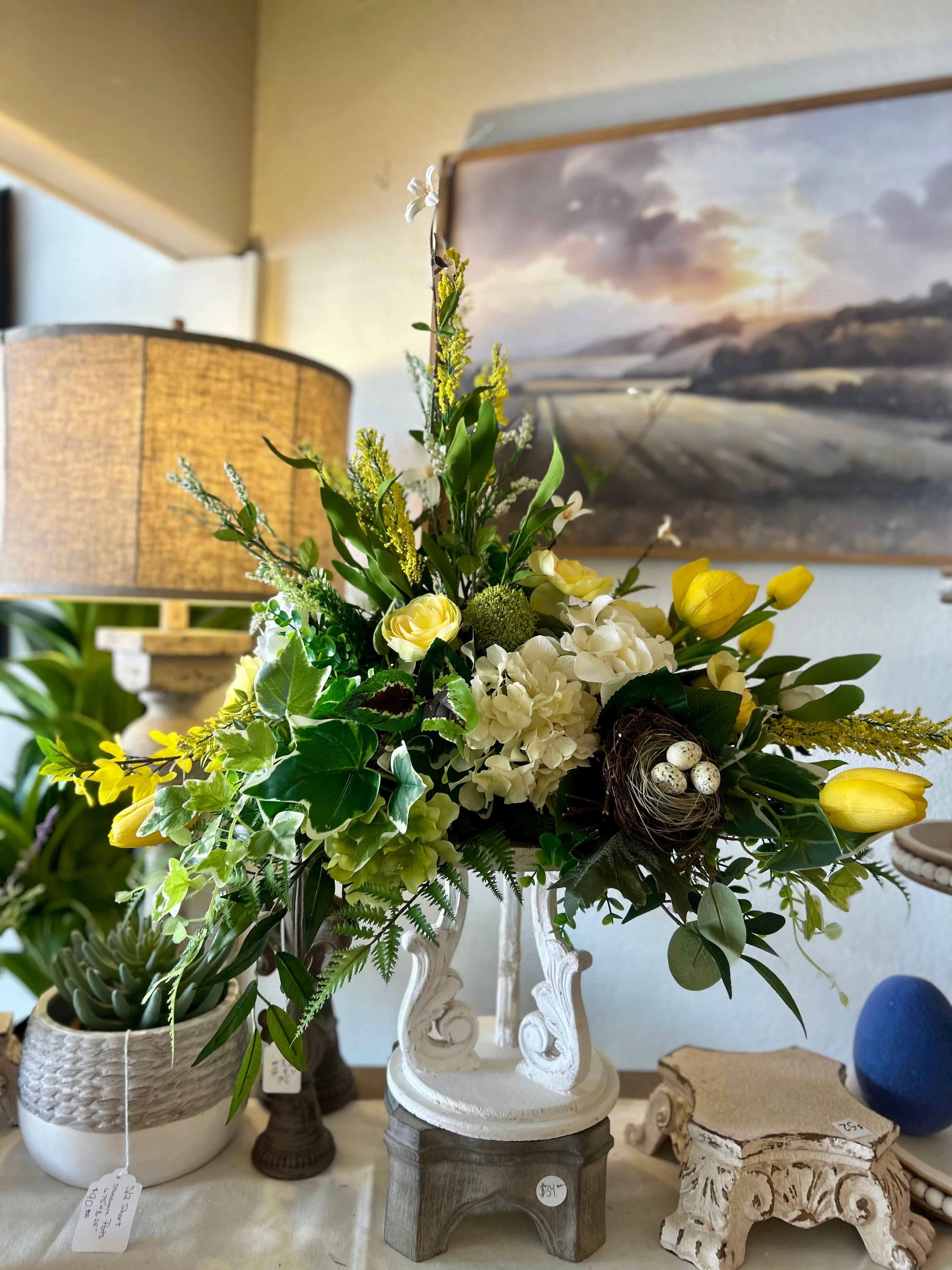 Yellow, White, and Mixed Greenery Birds Nest Arrangement