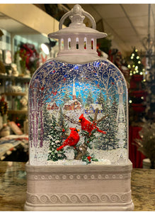 White Lantern Snow Globe with Cardinals and Church Scene