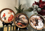 Load image into Gallery viewer, Cow Sleeping by Red White Hat Snowman Round Wood Frame Christmas Decor

