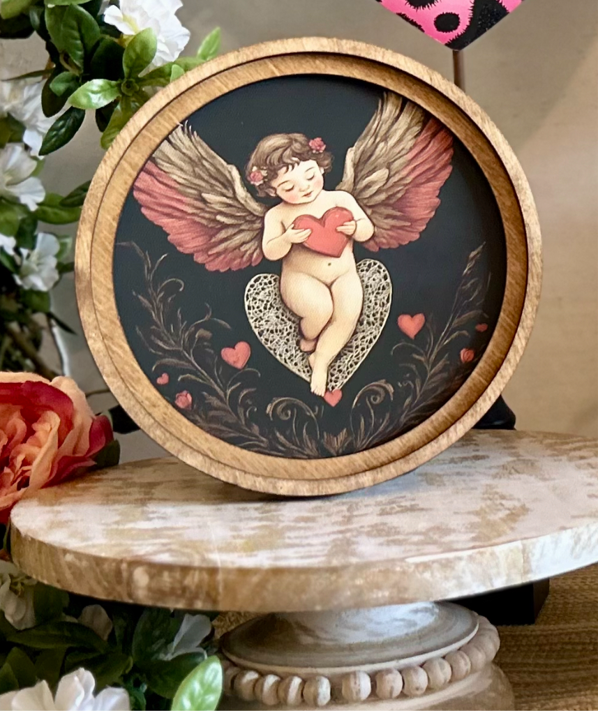 Round Top Wooden Cupid Art in Black, Pink, and Red
