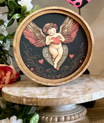 Load image into Gallery viewer, Round Top Wooden Cupid Art in Black, Pink, and Red
