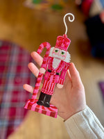 Load image into Gallery viewer, Hot Pink, Red, White Nutcracker Metal Ornament
