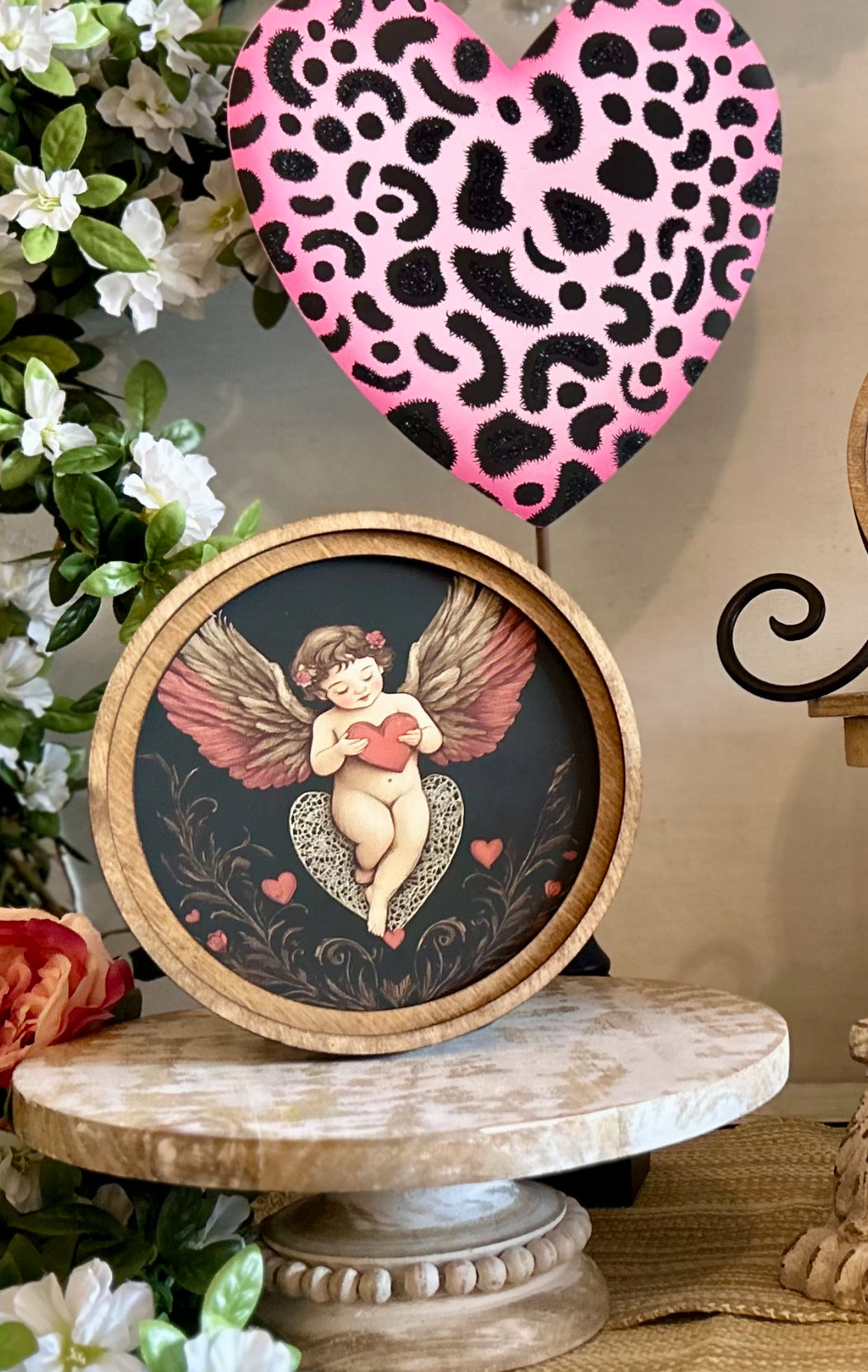 Round Top Wooden Cupid Art in Black, Pink, and Red