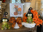 Load image into Gallery viewer, Phoebe the Frog with Black Witch Hat Spider and Holding Broom
