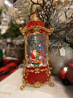 Load image into Gallery viewer, Musical 🎵Christmas Red and Gold Lantern Snow Globe with Santa and Moving Train
