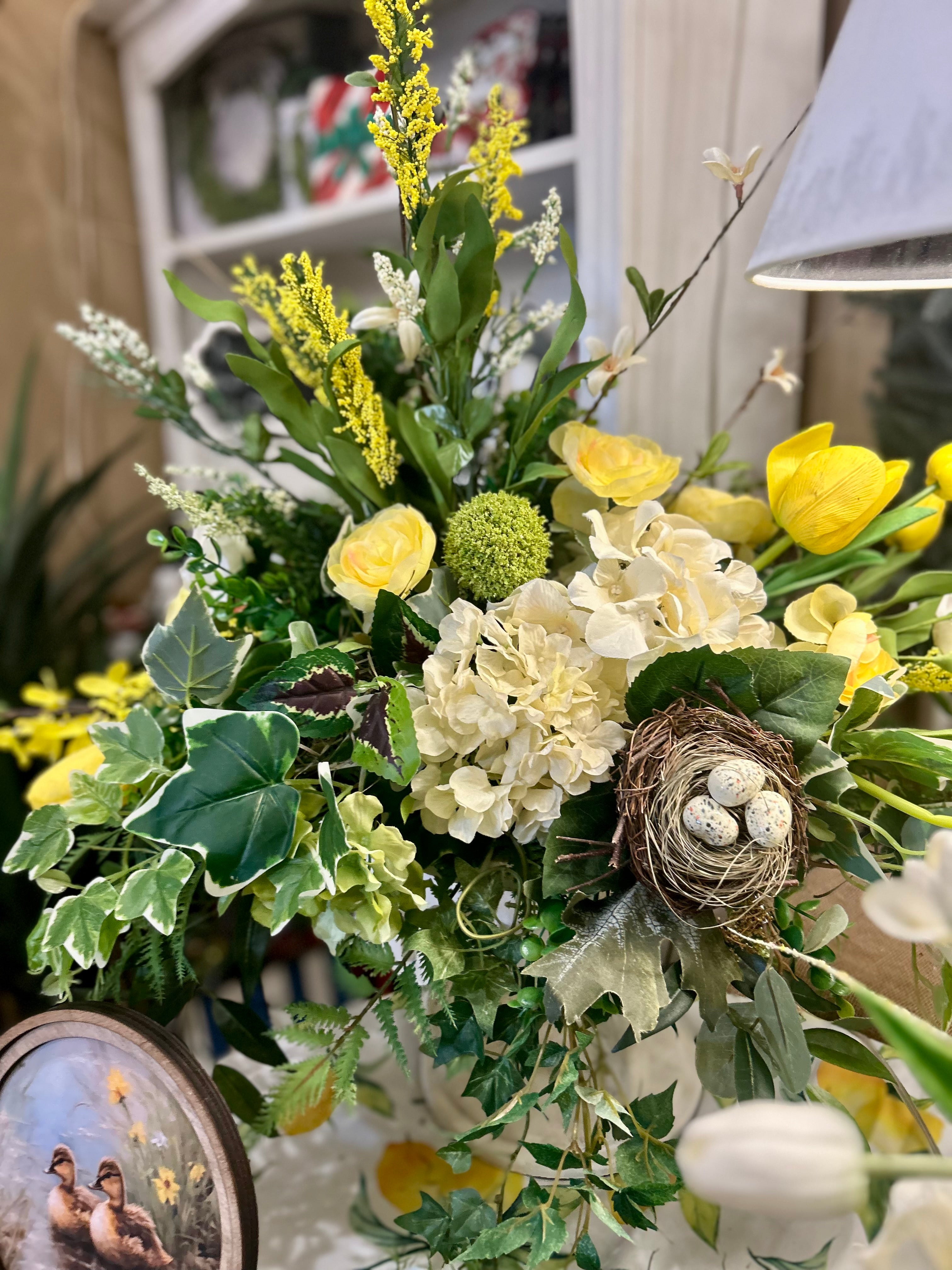 Yellow, White, and Mixed Greenery Birds Nest Arrangement