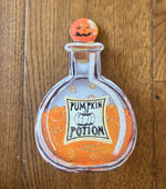Load image into Gallery viewer, Halloween Potion Bottles Metal Stakes with Easels Black, Purple, Orange, and Yellow with her Frog Roundtop Collection
