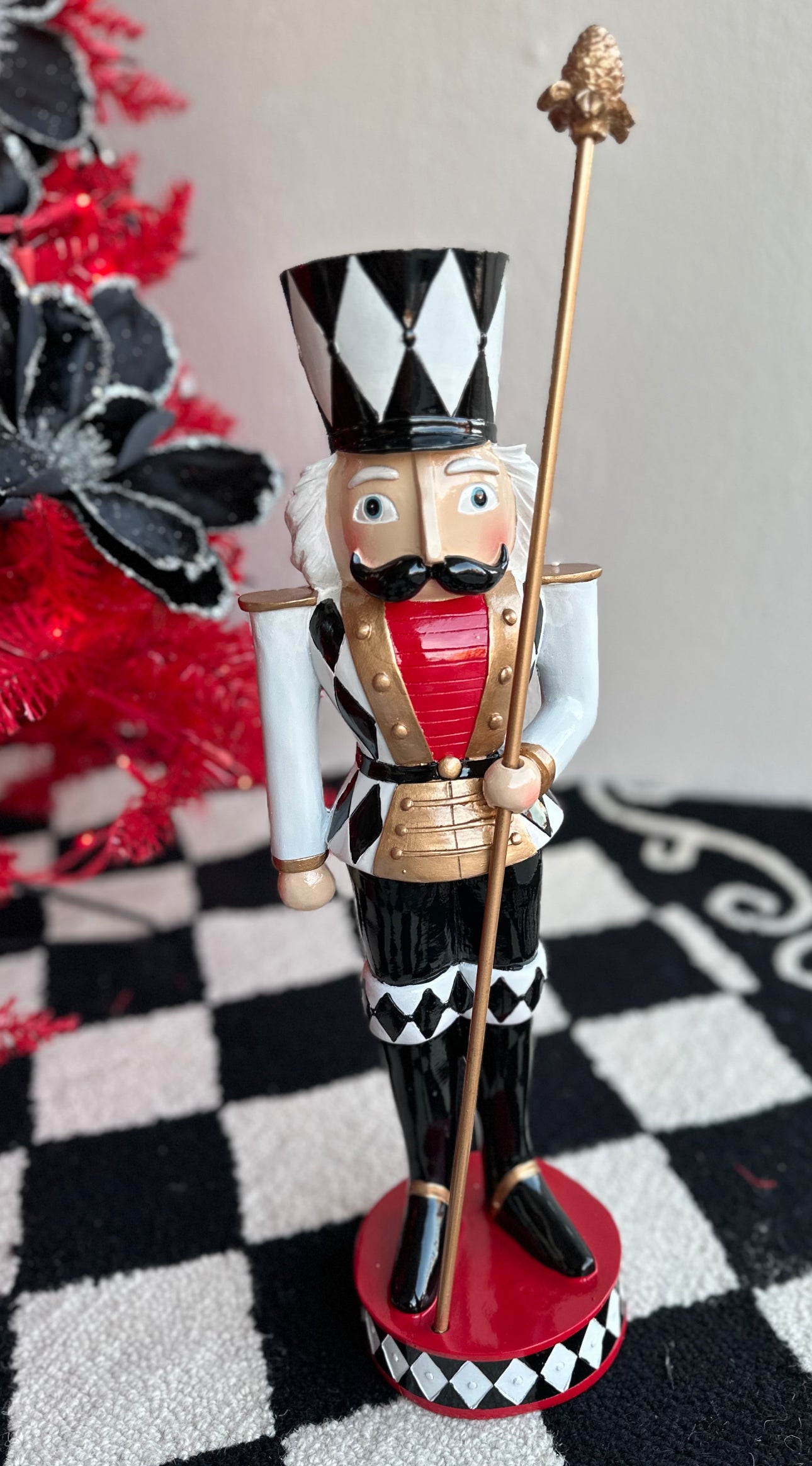 Black, Gold, and White Harlequin Soldier with Red Chest