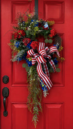 Load image into Gallery viewer, Americana: Geranium Wreath Red, White, Blue Stripe and Plaid Bow

