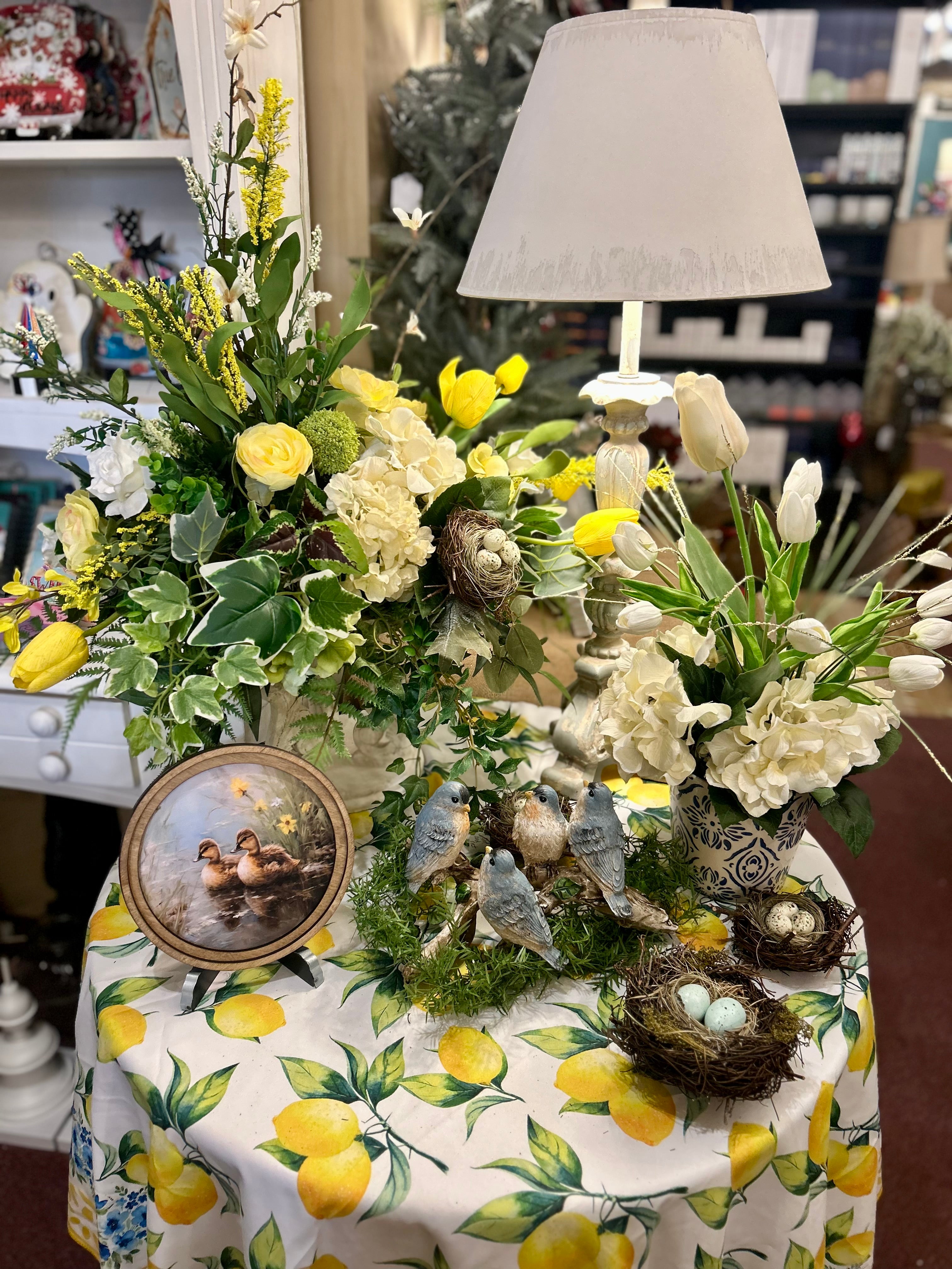 Yellow, White, and Mixed Greenery Birds Nest Arrangement