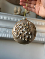 Load image into Gallery viewer, Set of 2 Silver, Gold, &amp; Mocha Pinecone Ornaments
