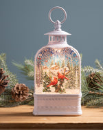 Load image into Gallery viewer, White Lantern Snow Globe with Cardinals and Church Scene
