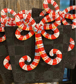 Load image into Gallery viewer, Black Check Metal Package with Candy Cane Bow Red &amp; White
