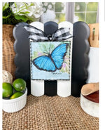 Load image into Gallery viewer, Blue Butterfly Galvanized Framed Mini Print with Floral Accents
