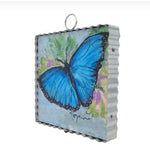 Load image into Gallery viewer, Blue Butterfly Galvanized Framed Mini Print with Floral Accents
