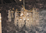 Load image into Gallery viewer, Glicina 8-Light Chandelier in Natural Brass by Quorum International
