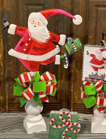 Load image into Gallery viewer, Skating Santa Metal Stake Red &amp; White
