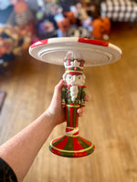 Load image into Gallery viewer, Nutcracker Cake Plate Stand Dolomite Red, Green, and White Riser
