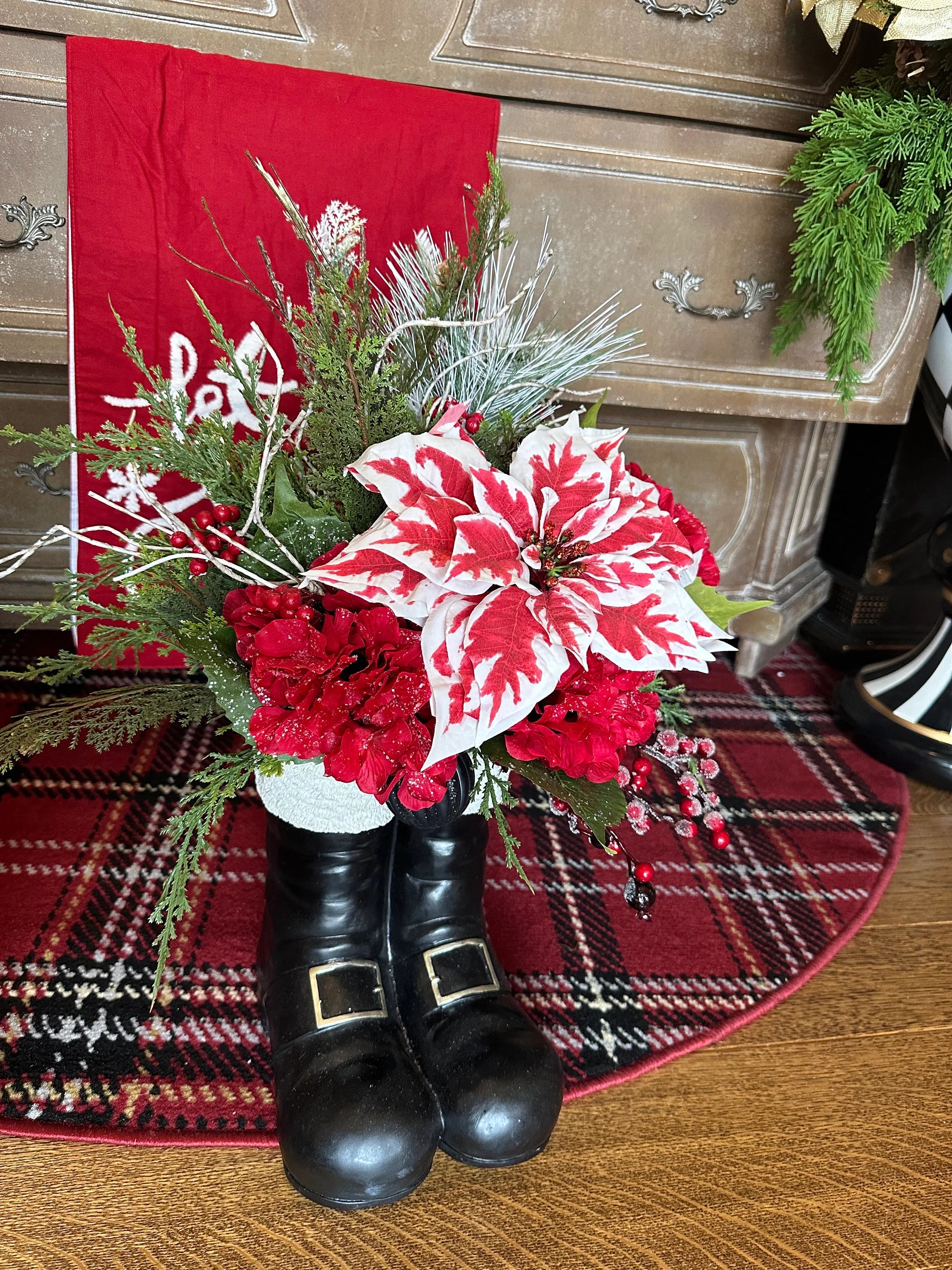 Christmas Red and White Peppermint Poinsettia Arrangement in Resin Black Santa Boots