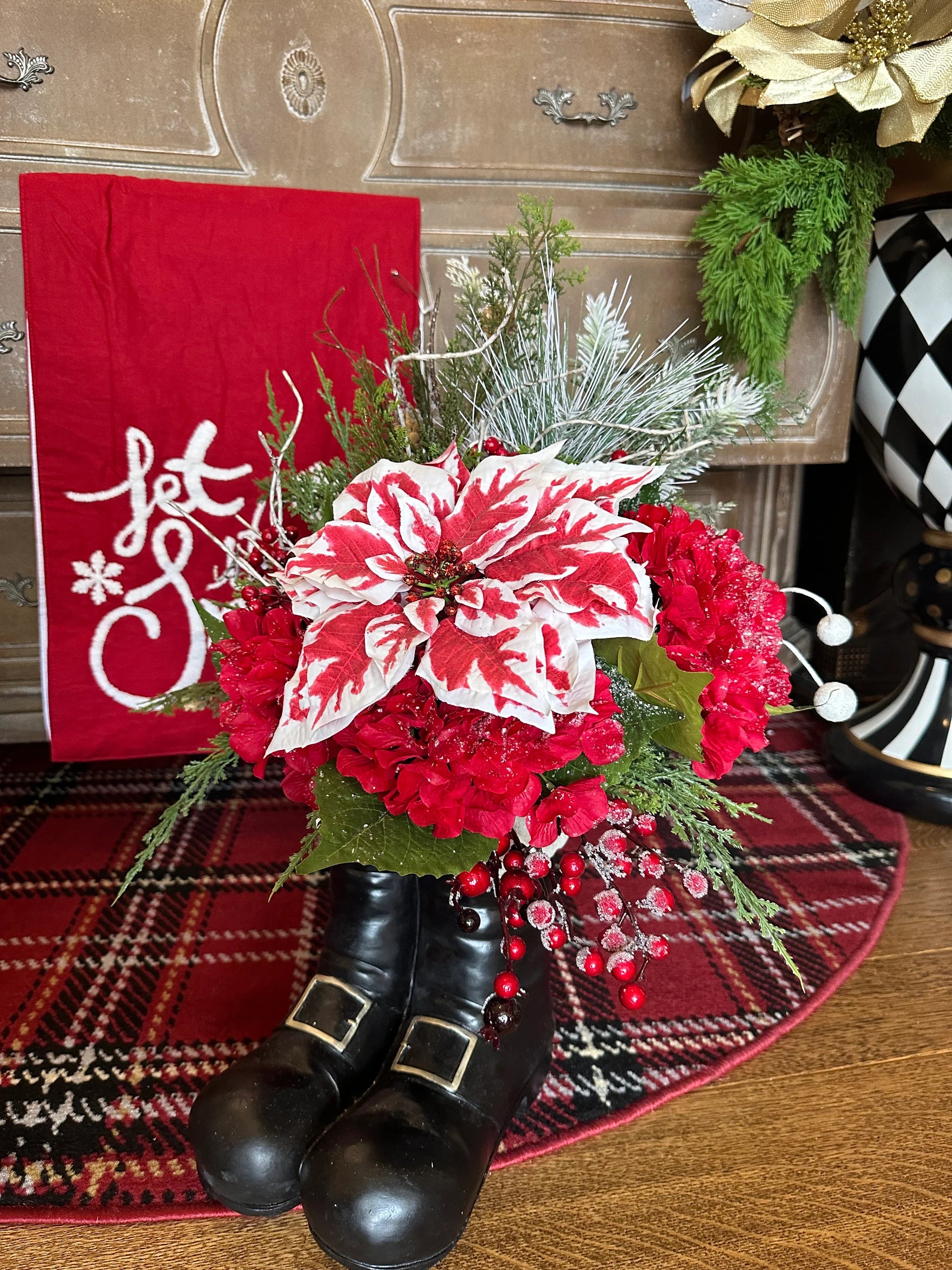 Christmas Red and White Peppermint Poinsettia Arrangement in Resin Black Santa Boots