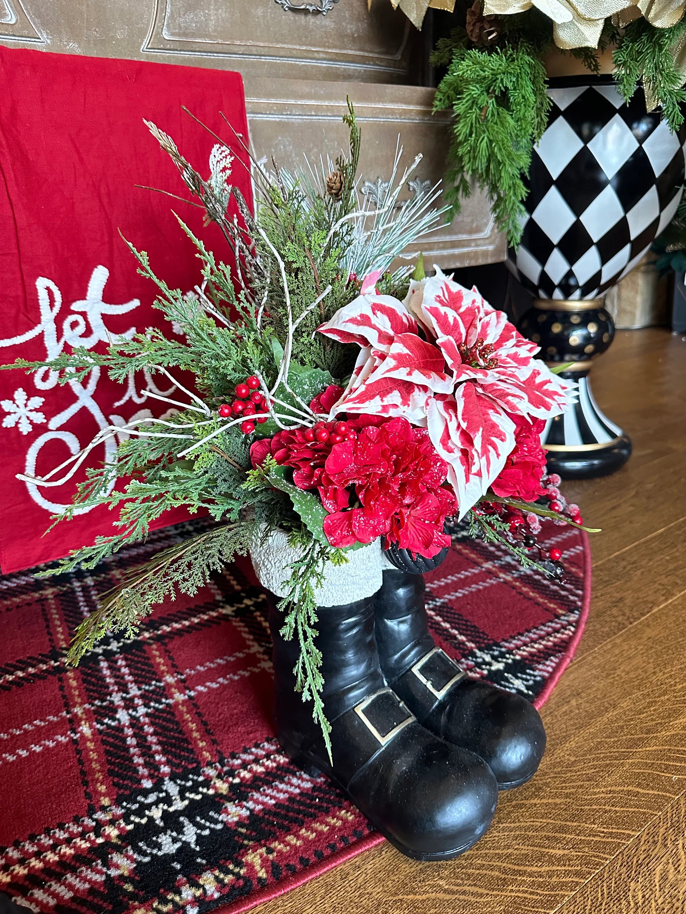 Christmas Red and White Peppermint Poinsettia Arrangement in Resin Black Santa Boots