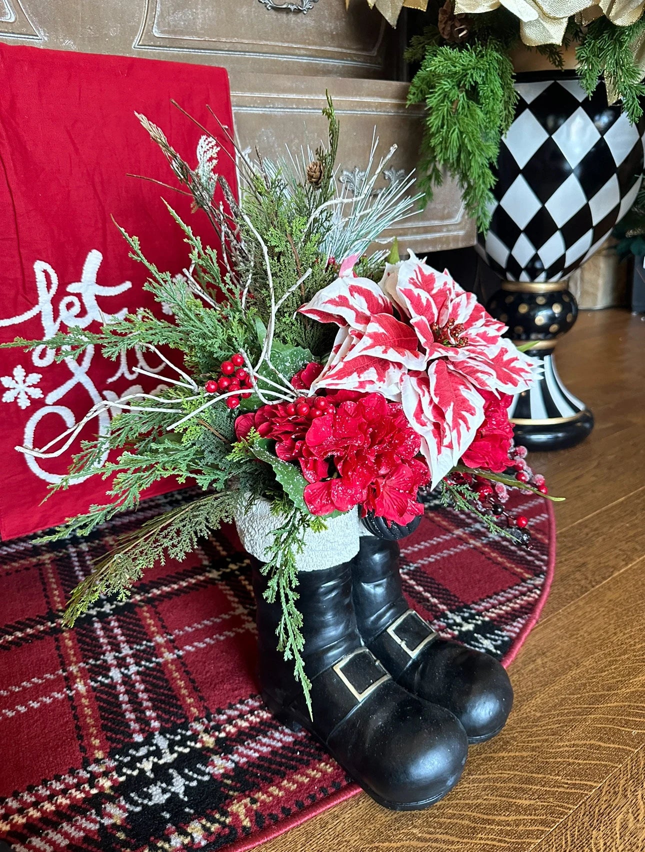 Christmas Red and White Peppermint Poinsettia Arrangement in Resin Black Santa Boots