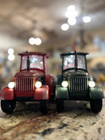 Load image into Gallery viewer, Red or Green Tractor Snow Globe with Santa driving, Tractor lights up
