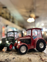 Load image into Gallery viewer, Red or Green Tractor Snow Globe with Santa driving, Tractor lights up
