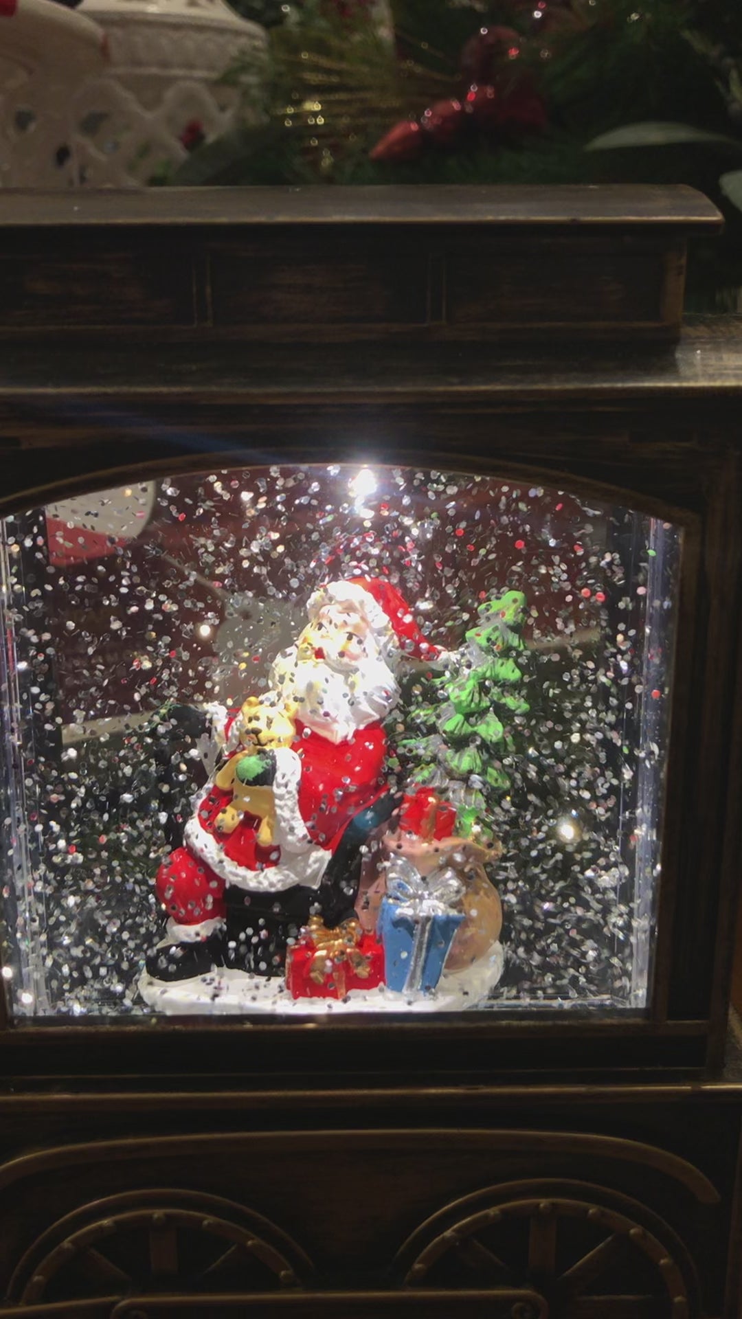 Santa Clause in Bronze Train Snow Globe LED