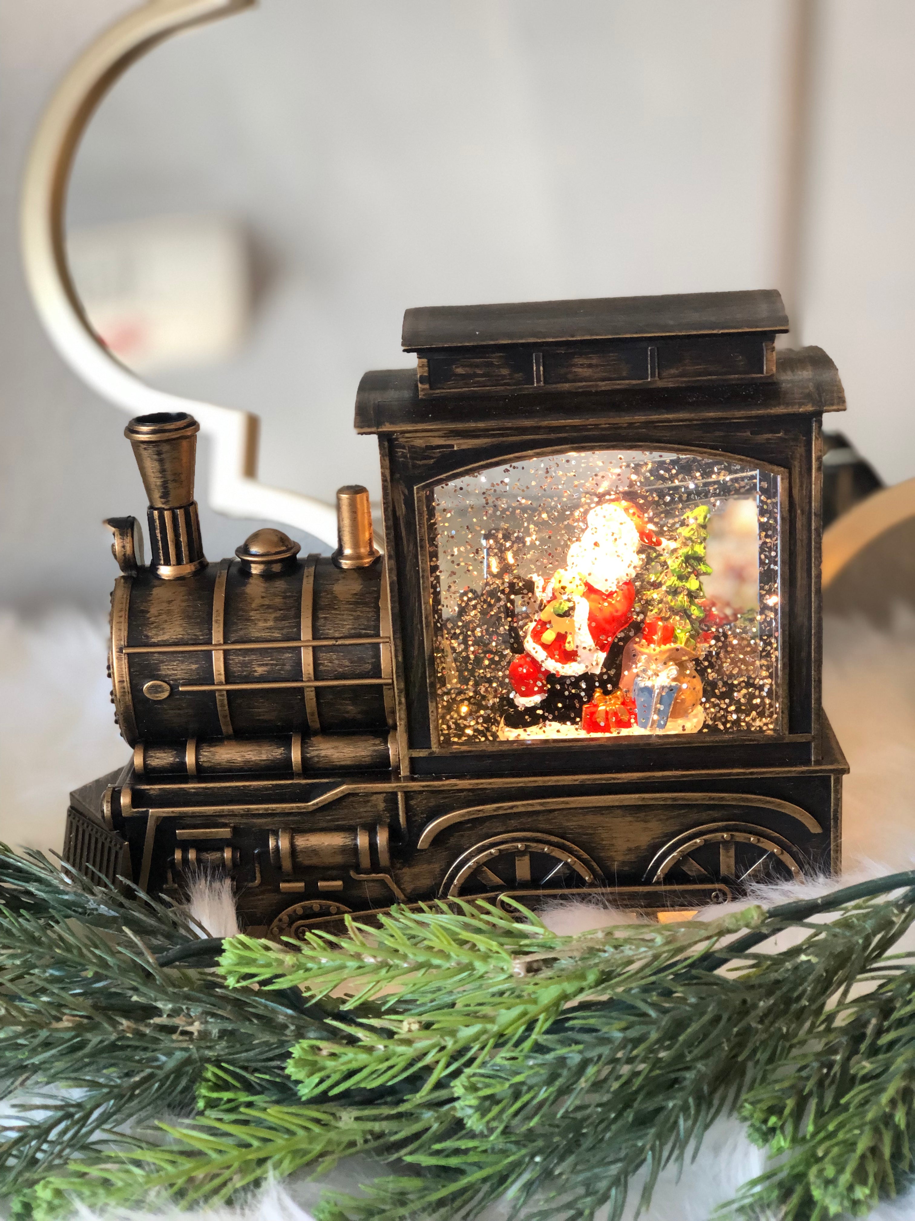 Santa Clause in Bronze Train Snow Globe LED