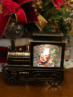 Load image into Gallery viewer, Santa Clause in Bronze Train Snow Globe LED
