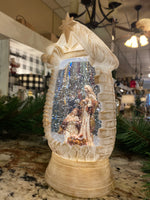 Load image into Gallery viewer, Snow globe with Holy Family LED Manger Scene and Star
