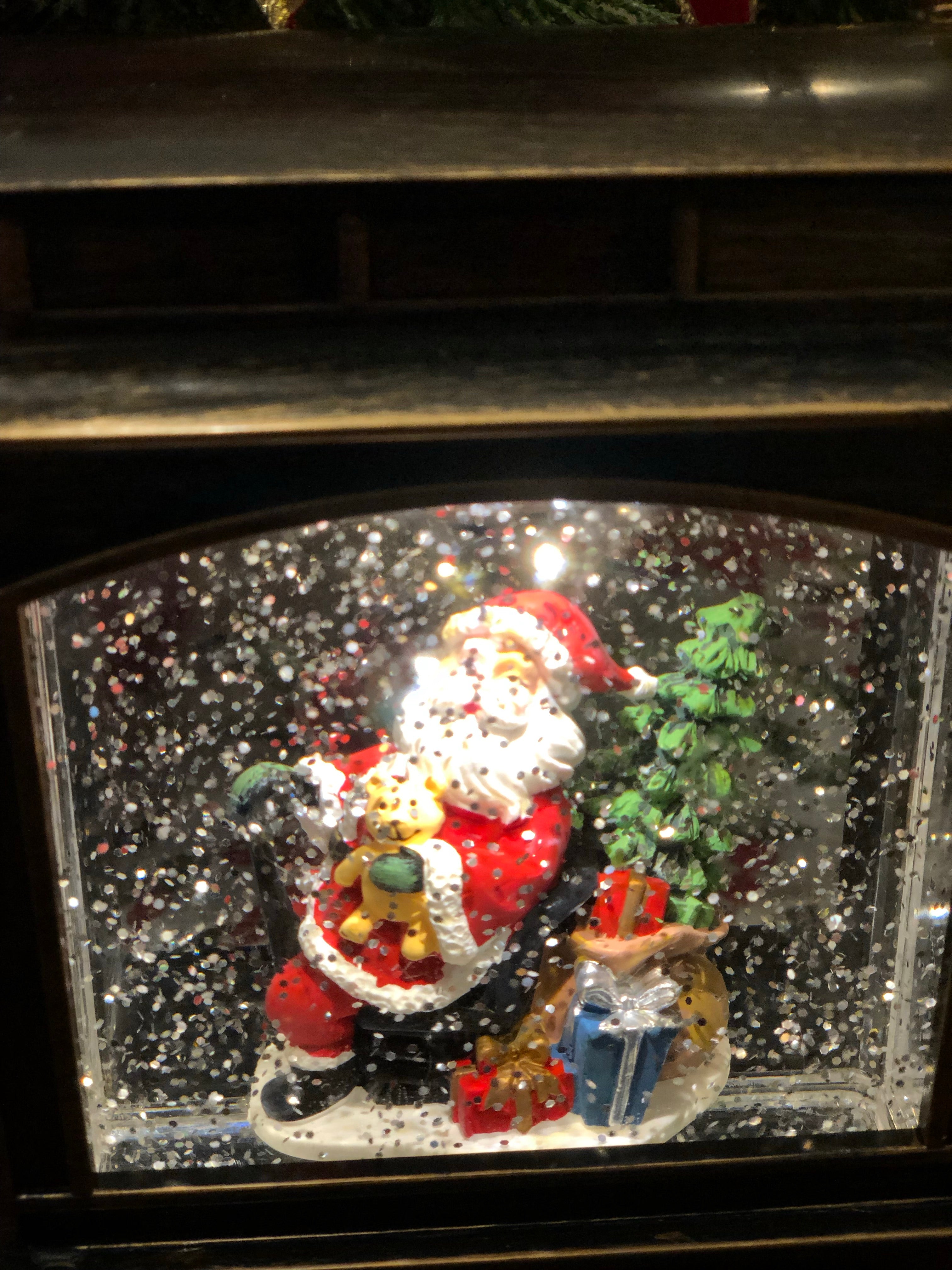 Santa Clause in Bronze Train Snow Globe LED