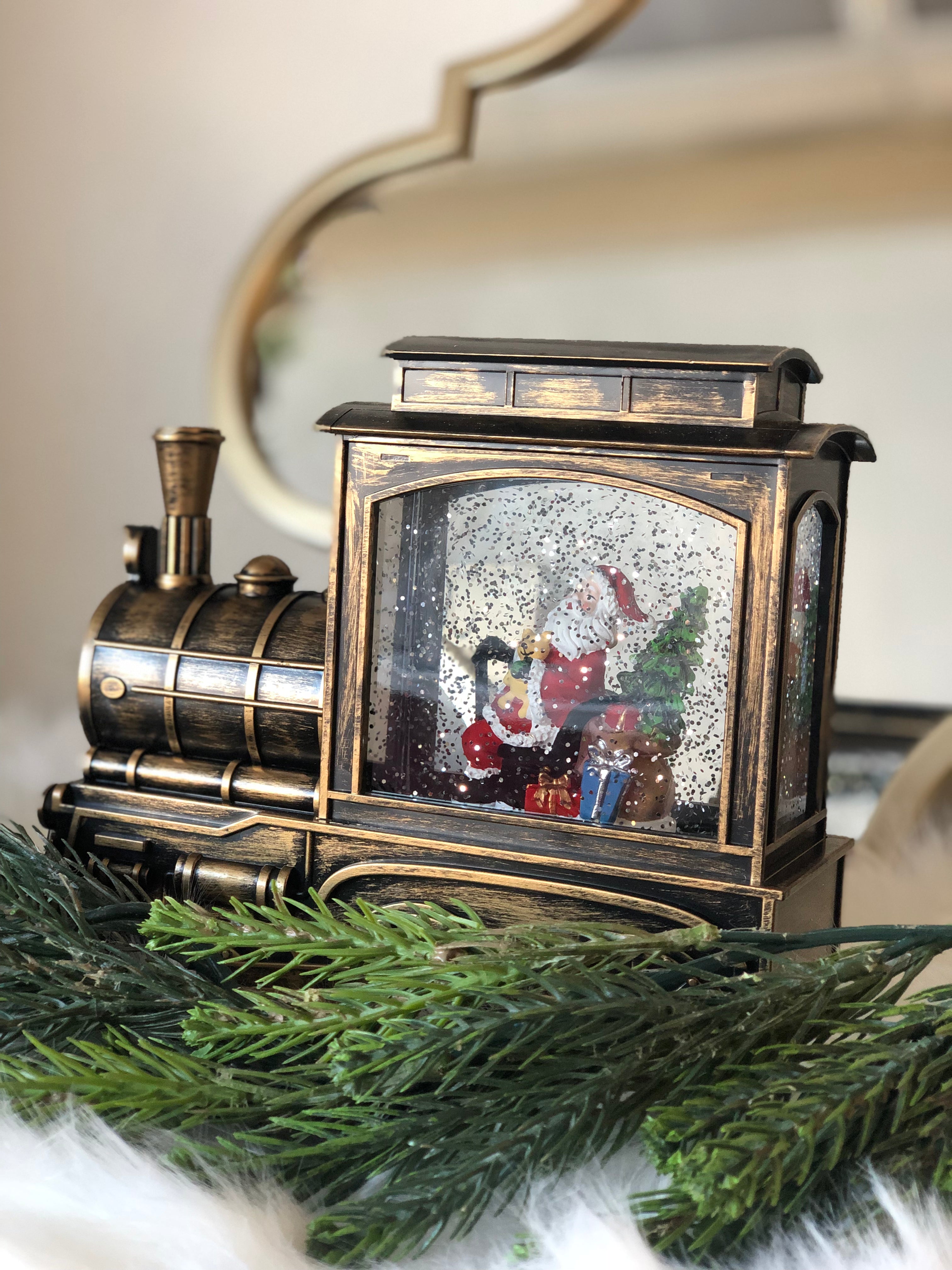 Santa Clause in Bronze Train Snow Globe LED