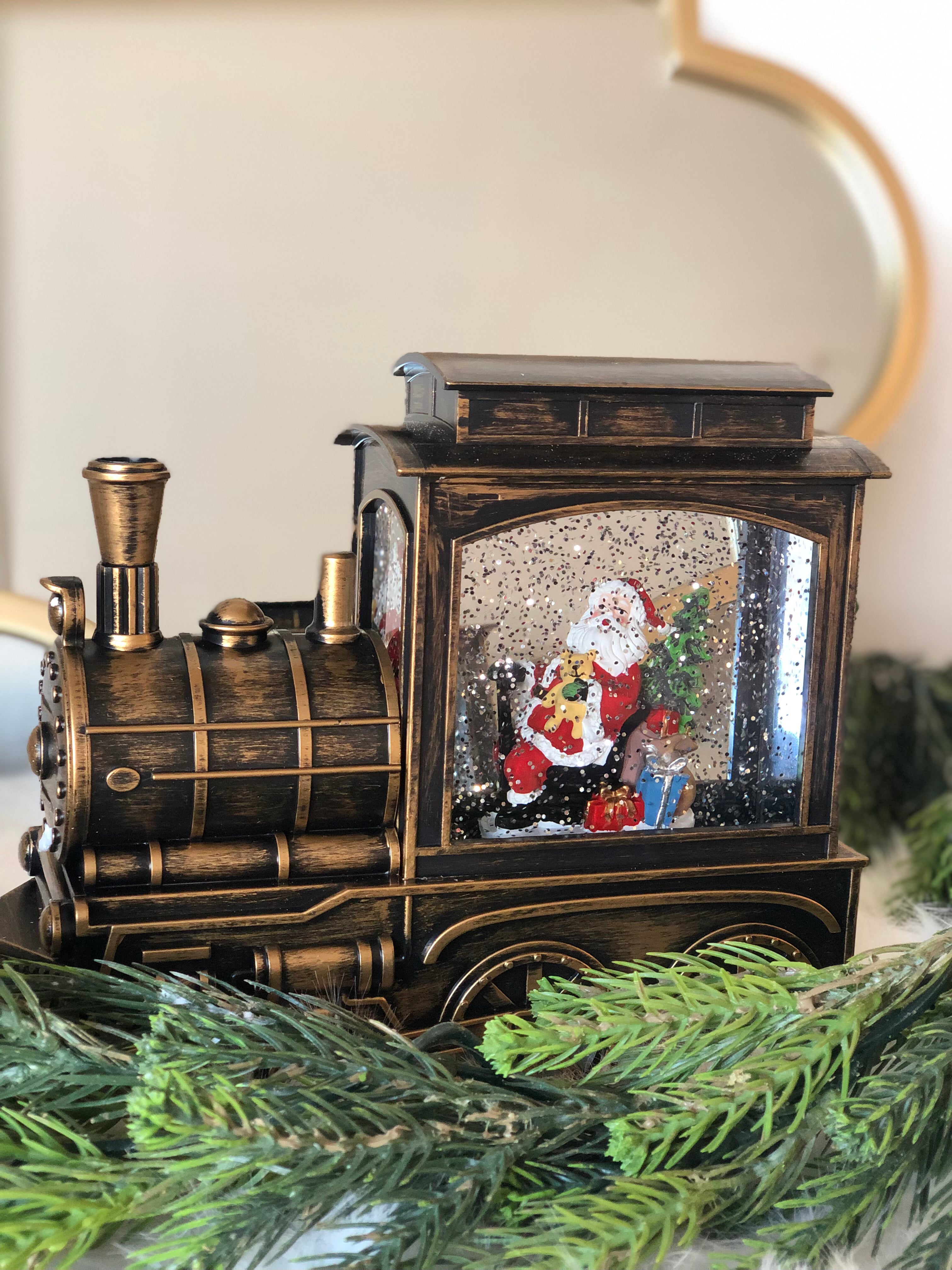 Santa Clause in Bronze Train Snow Globe LED