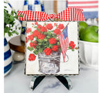 Load image into Gallery viewer, Americana: Bucket of Red Geraniums and American Flag Mini Print
