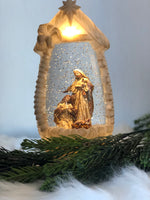 Load image into Gallery viewer, Snow globe with Holy Family LED Manger Scene and Star
